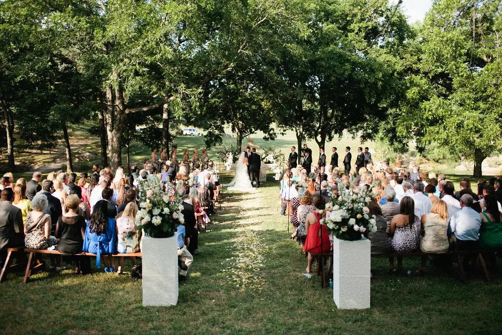 Wedding day with a large crowd at the ceremony