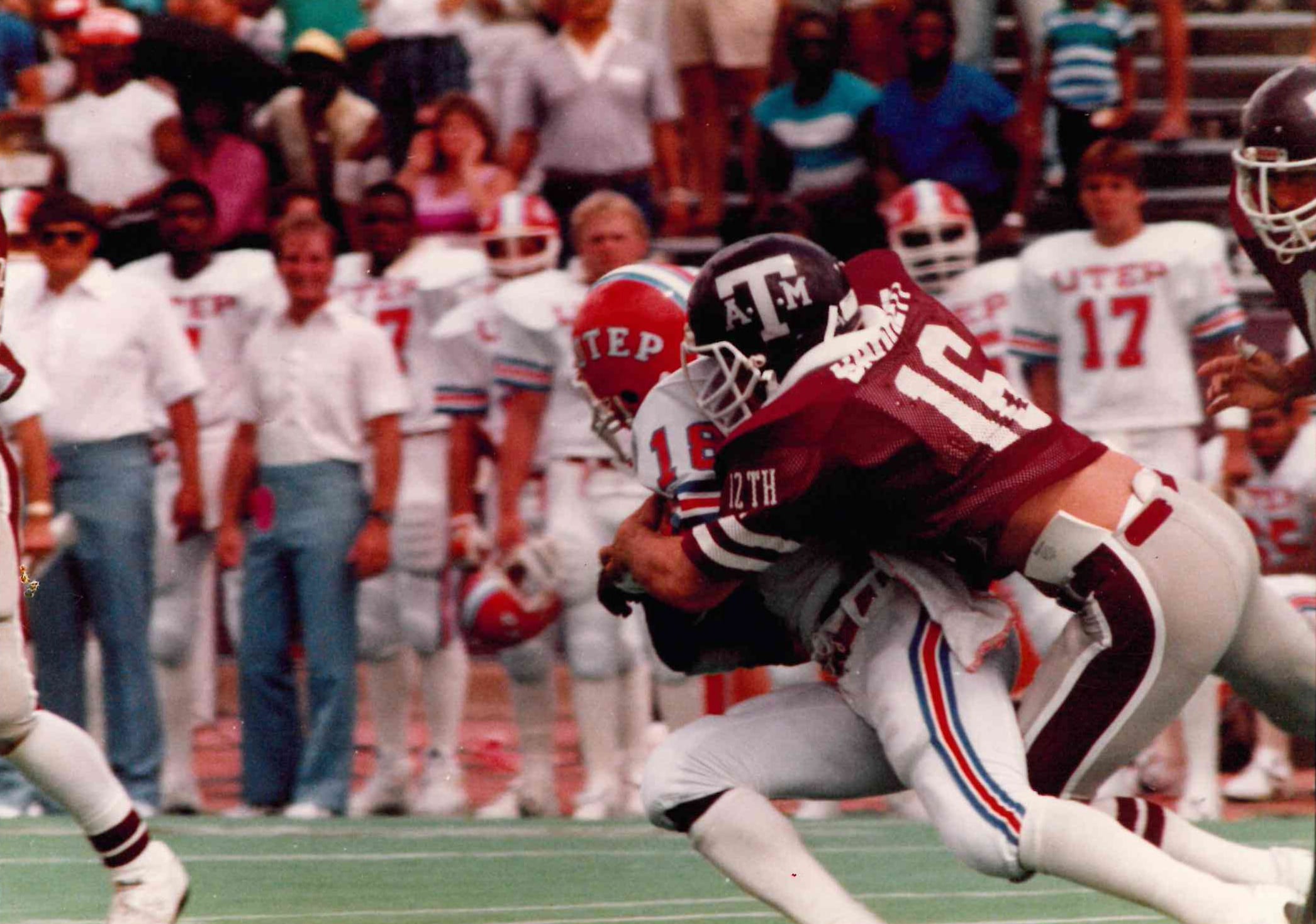 Football game, man getting tackled