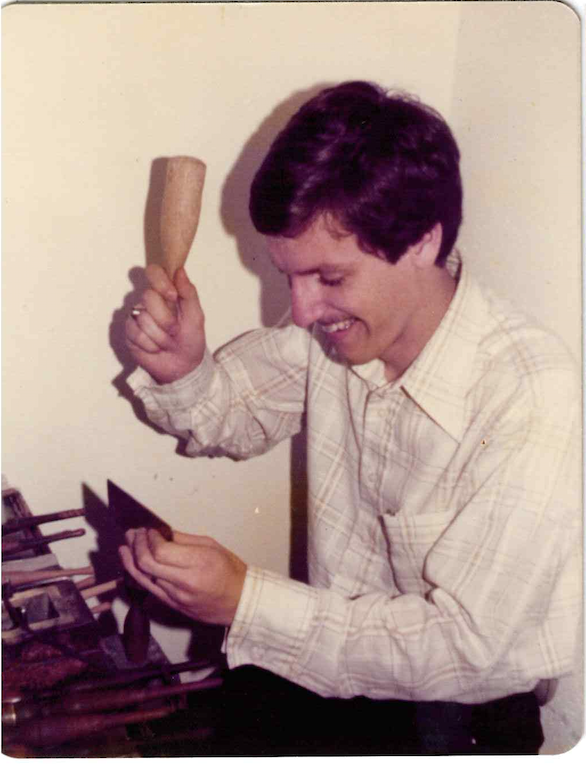 David Gardner working at his bench on jewelry