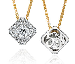 Two silver pendants with gold chains, one with a 50th anniversary design engraved