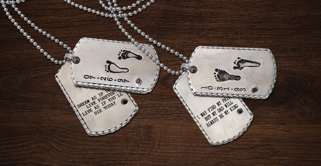 Custom designed dog tags with inscriptions of words as well as footprints