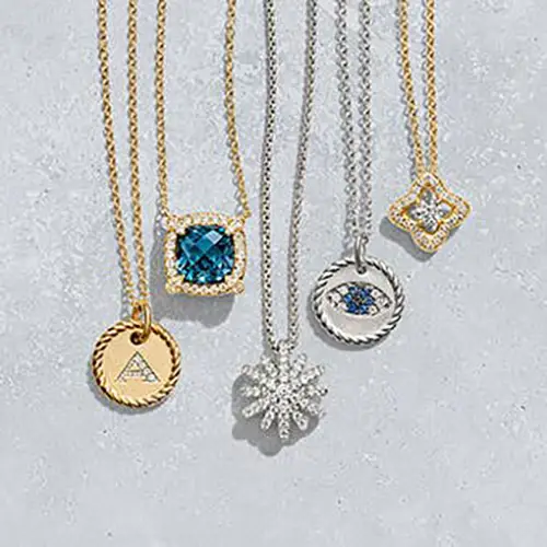 David Yurman pendant necklaces in silver and gold.